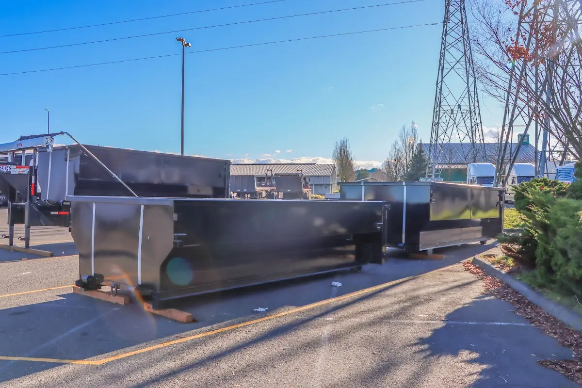 Roll-off dumpster ready for waste disposal at job site for 3 Yard Dumpster Rental in Monaca